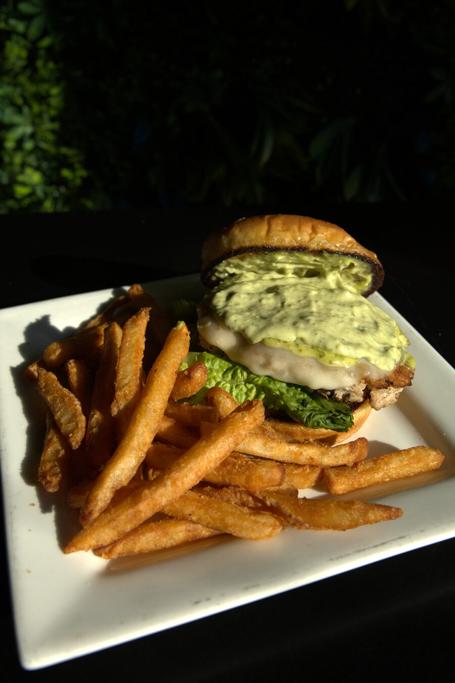A burger and fries from The District's kitchen